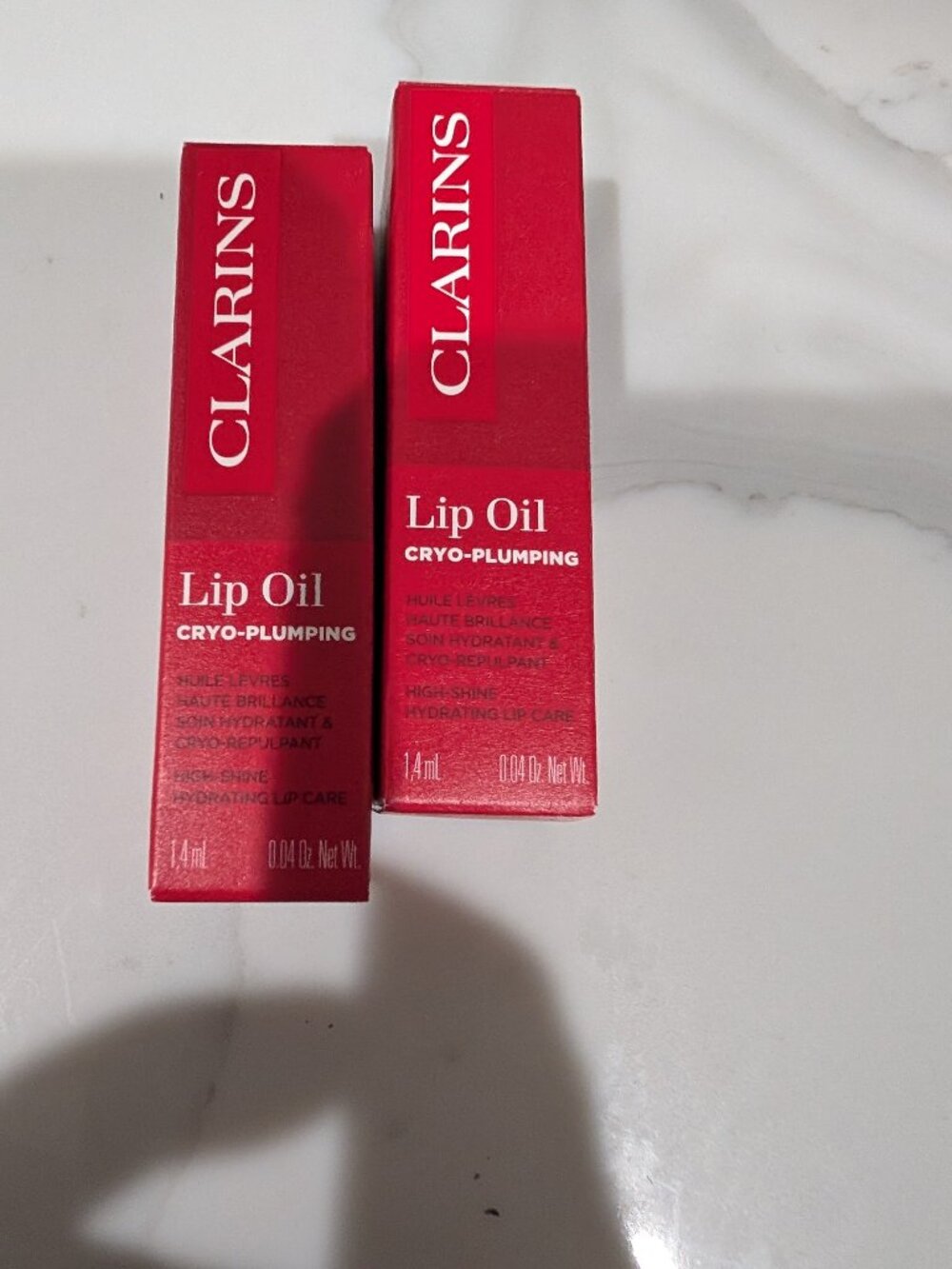 Clarins lip oil cryo-plumping lip oil hydrating lip care